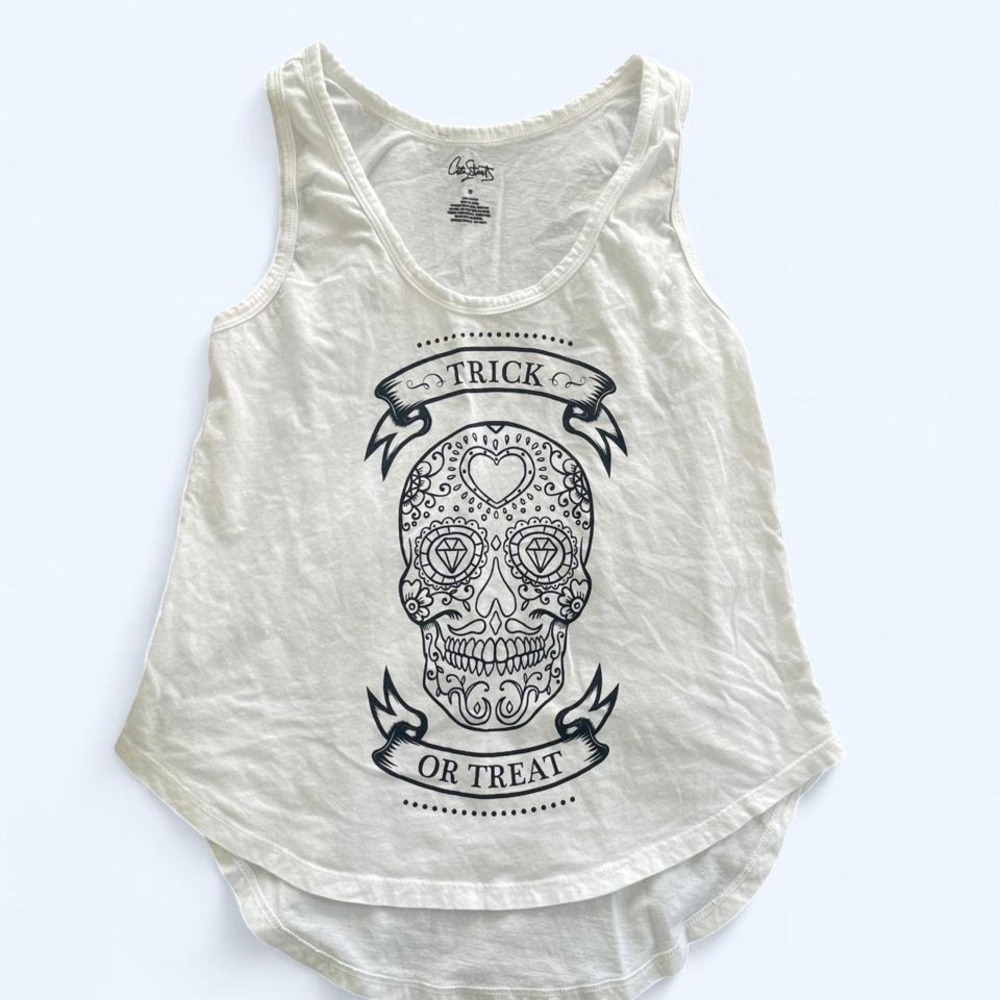 White cotton tank top featuring a black graphic of a sugar skull TRICK OR TREAT‎